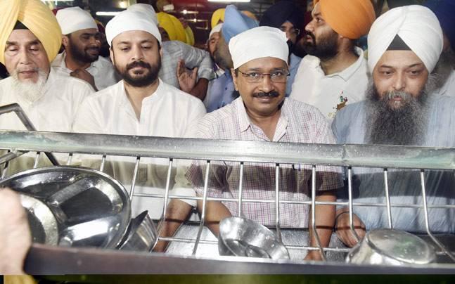 Kejriwal and others, who remained in the shrine for about an hour, also partook of “langar” (community food). - Sakshi Post