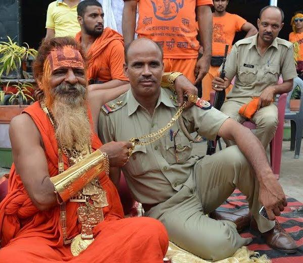 The ‘golden baba’ with 12 kgs of gold including chains, lockets and rings. The ‘golden baba’ with 12 kgs of gold including chains, lockets and rings. - Sakshi Post