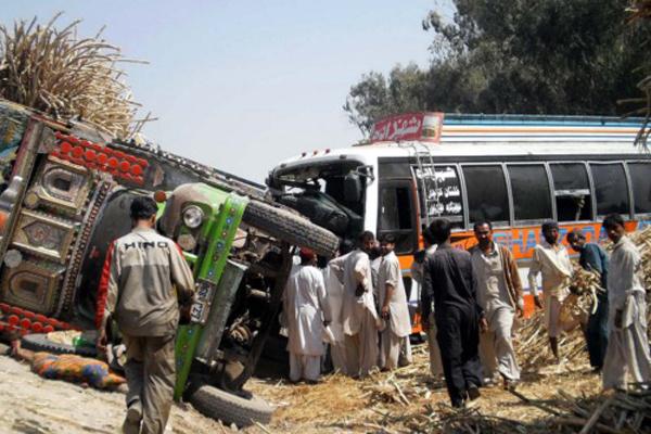 The accident took place when the speeding bus travelling towards Karachi from Dera Ismail Khan rammed onto the stationary truck, Dawn online reported - Sakshi Post