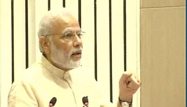 “We cannot march through the 21st century with the administrative systems of the 19th century. There is need of collective opening of the minds, to let in new, global perspectives,” Modi said - Sakshi Post