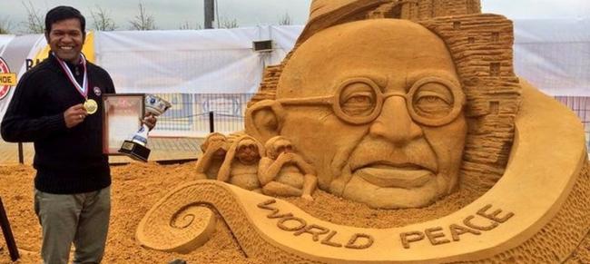 Sudarsan Pattnaik with his creation - ‘World Peace’. - Sakshi Post