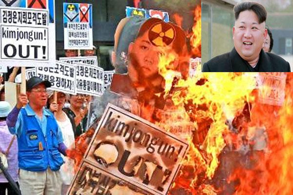 The activists burnt anti-nuclear placards displaying the North Korean leader’s photos and slogans reading “Down with North Korea” and “Kim Jong-un out”. - Sakshi Post