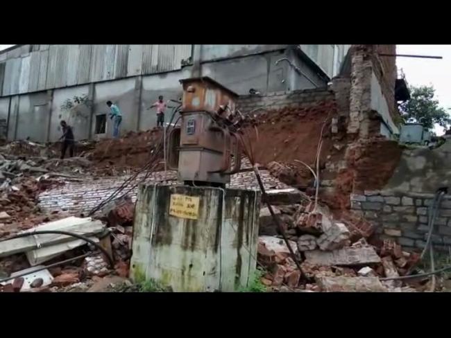 A caved-in wall and a damaged transformer... - Sakshi Post