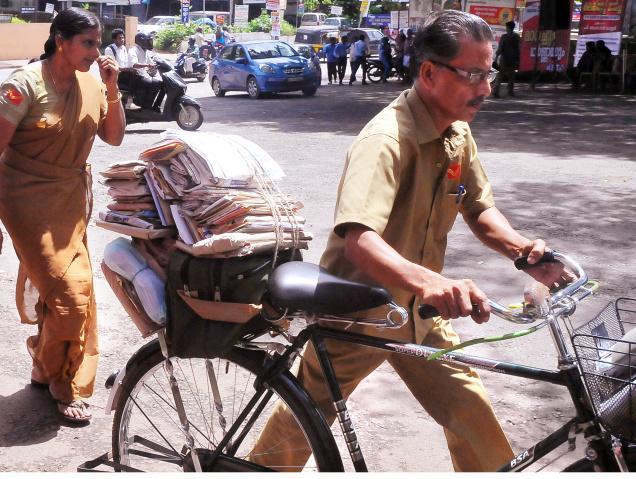 The word Postman only signifies men in khaki who deliver postal mails. But there are also postwomen working in India Post - Sakshi Post