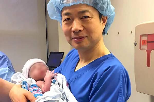 Dr John Zhang with world’s first baby born using a new ‘three person’ fertility technique in Mexico - Sakshi Post