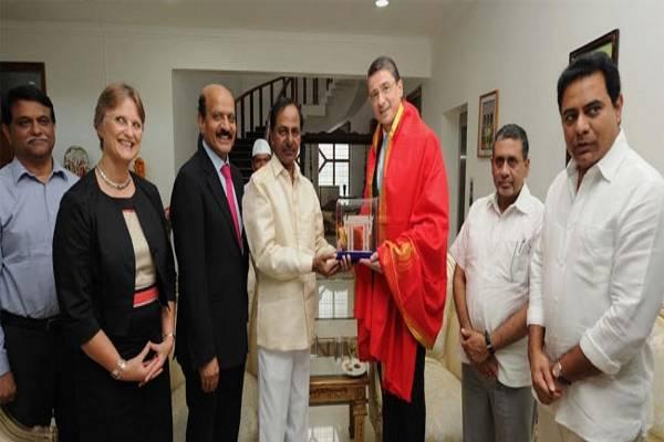 Chief Minister KCR with BVR Mohan Reddy(left) and German Ambassador Martin Ney (right) - Sakshi Post