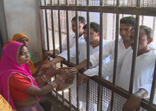 Prisoners being tied rakhis at Jaipur central jail - Sakshi Post