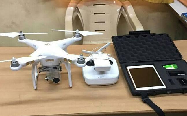 The seized drone and iPad - Sakshi Post