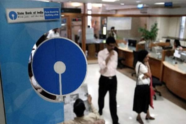 State Bank of India has urged its customers to replace their old debit cards with new ones - Sakshi Post