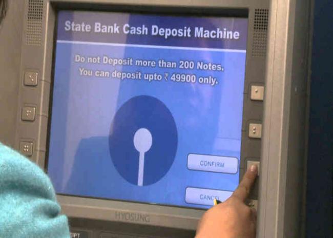 A Cash Deposit Machine of the State Bank of India A Cash Deposit Machine of the State Bank of India - Sakshi Post