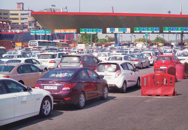 The government has further extended the date for toll exemption on National Highways till mid-night of December 2. - Sakshi Post