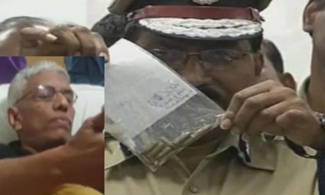 Hyderabad Commissioner of Police P. Mahender Reddy shows the bullets recovered from the accused; Manmadha Dalia (inset) - Sakshi Post