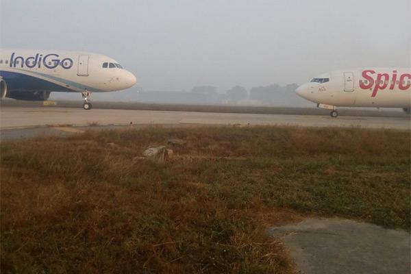 An Indigo and a SpiceJet aircraft came face to face on the taxi way, at the IGI airport on Tuesday. - Sakshi Post