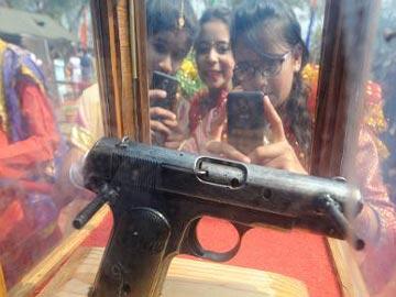 The historic .32mm Colt automatic pistol used by Shaheed Bhagat Singh on display at BSF’s Indore museum. - Sakshi Post
