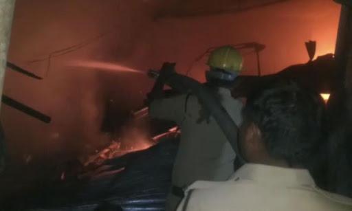 Fire service personnel battling the flames - Sakshi Post