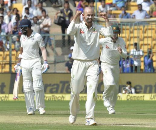 Off-spinner Nathan Lyon, after taking the wicket of KL Rahul during the second Test match between India and Australia in Bengaluru on Saturday. - Sakshi Post