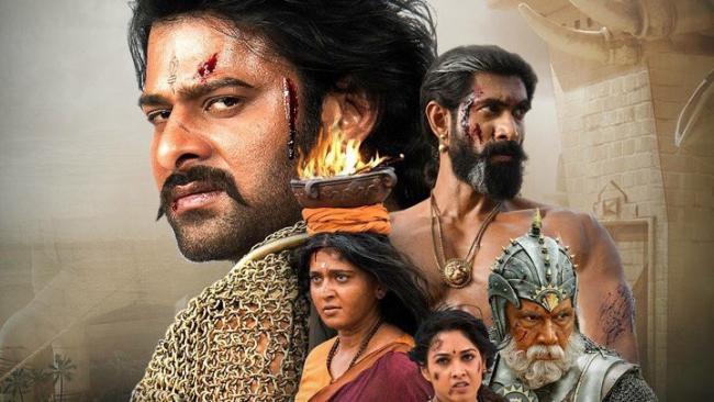 Baahubali 2 Hindi version grossed Rs 128 crore in the opening weekend to beat Salman Khan’s “Sultan” and Aamir’s “Dangal” . - Sakshi Post