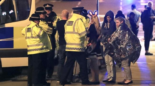 Emergency services work at Manchester Arena after reports of an explosion at the venue during an Ariana Grande gig in Manchester, England, on Monday. (Photo: AP)&amp;amp;nbsp; - Sakshi Post