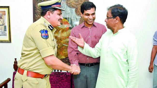 Muzammil Khan, the son of retired IPS officer AK Khan, who secured the 22nd rank being congratulated by Rachakonda Commissioner Mahesh Bhagwat - Sakshi Post