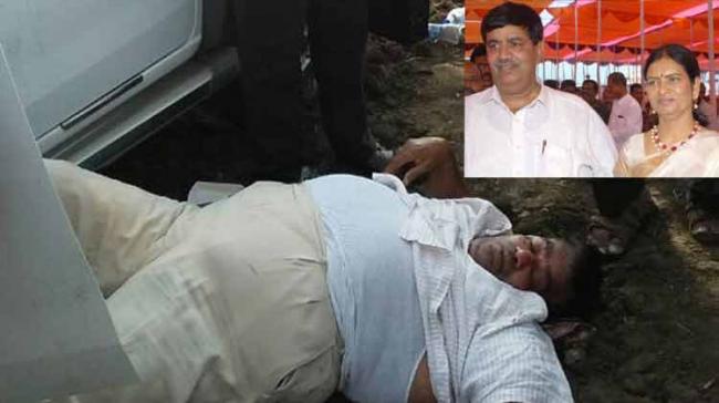 D.K Bharatha Simha Reddy is seen falling unconscious following the road accident that occurred at Marikal mandal in Mahbubnagar district on Wednesday evening. - Sakshi Post
