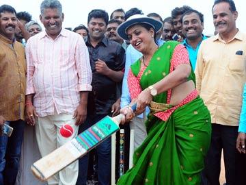 YSRCP Woman Wing’s president playing a shot during the launch of YSR Rural Cricket tourney in Tummalagunta village, Tirupati. - Sakshi Post