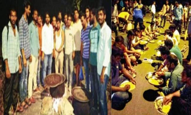 The students staged ‘rasta roko’ and cooked food on the roadside late Saturday night inside the campus near hostels - Sakshi Post
