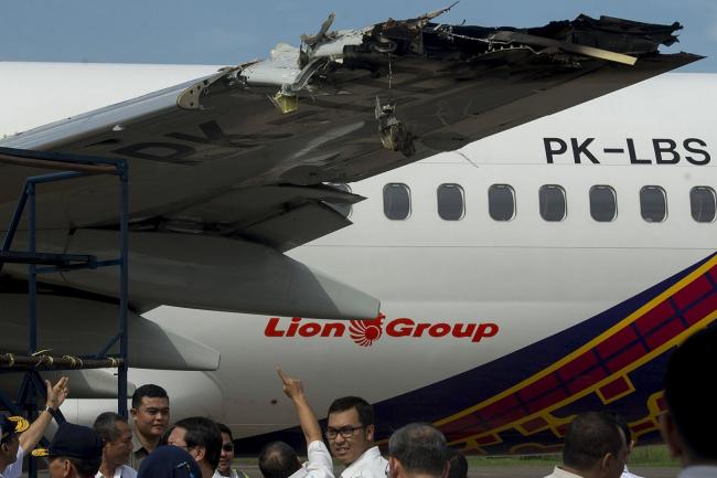 The damaged wing portion of the Lion Group plane - Sakshi Post