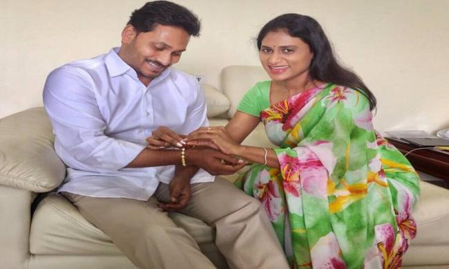 YS Sharmila tied a rakhi on the wrist of her brother and YSRCP chief YS Jagan Mohan Reddy - Sakshi Post