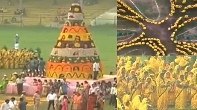 Rain played spoil sport as thousands of women gathered at the LB stadium to attempt to create a new Guinness Record during ‘Saddula Bathukamma’. Rain played spoil sport as thousands of women gathered at the LB stadium to attempt to create a new Guinness Record during ‘Saddula Bathukamma’. - Sakshi Post