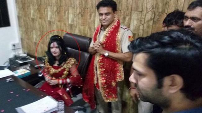 Radhe maa sits on Station House Officer’s chair at Delhi police station - Sakshi Post