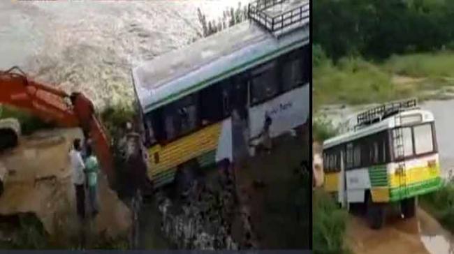 The incident occurred when the bus was heading to the village on the Bahuda river causeway. Due to sudden surge of flood waters, the bus got trapped in the swirling waters of the river. - Sakshi Post