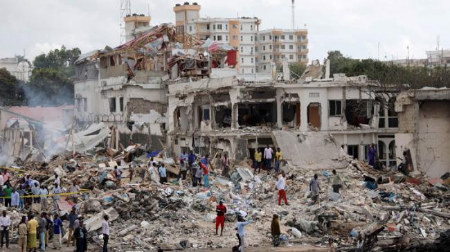 The scene of the explosion in Mogadishu. Photograph: Feisal Omar/Reuters &amp;amp;nbsp; - Sakshi Post