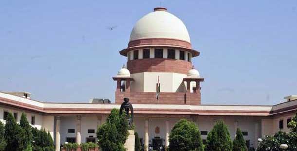 A bench of Justices Madan B Lokur and Deepak Gupta, which slapped a fine of Rs two lakh on union environment ministry for not finalising pollution emission standards for industries using pet coke and furnace oil in the national capital region (NCR),  - Sakshi Post