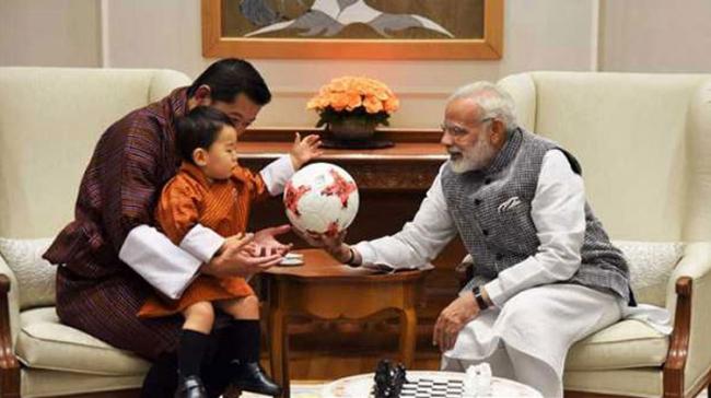 PM Narendra Modi meets with Bhutan’s Jigme Khesar Namgyel Wangchuck and his son - Sakshi Post