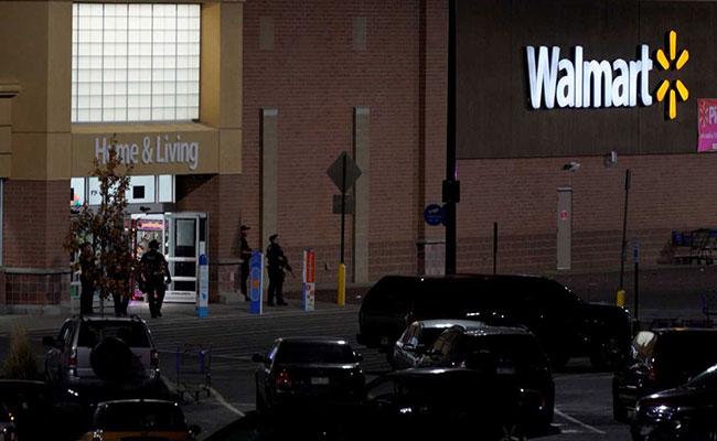 Police guard the entrance at the scene of a shooting at a Walmart in Thornton, Colorado - Sakshi Post