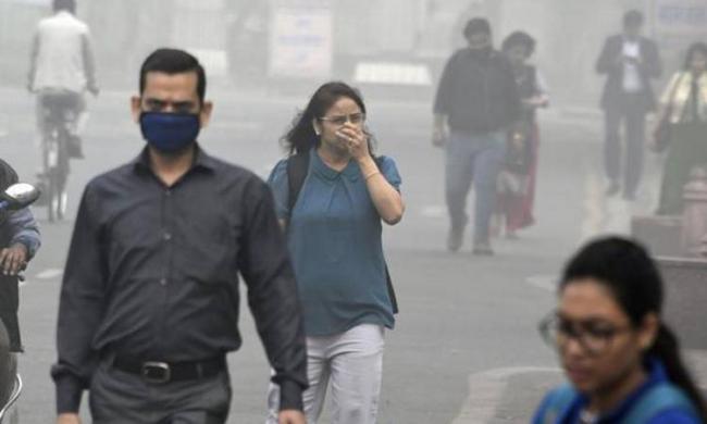 Tuesday, a yellow blanket of smog hung heavily in the city sky, making the the quality of air even worse than a day after Di - Sakshi Post