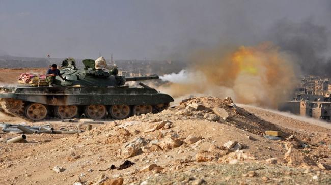 Storming the al-Bukamal in the eastern countryside of Deir al-Zour province comes after the troops completely besieged the city, which is bordering Iraq Storming the al-Bukamal in the eastern countryside of Deir al-Zour province comes after the troops completely besieged the city, which is bordering Iraq - Sakshi Post