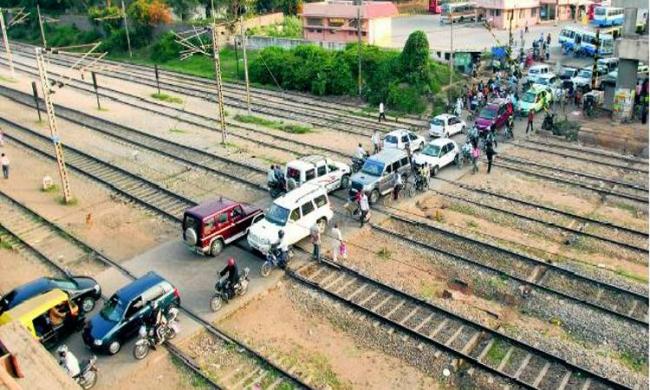 The space technology, adopted with the help of Indian Space Research Organisation (ISRO), will warn road users through hooters once a train approaches an unmanned level crossing The space technology, adopted with the help of Indian Space Research Organisation (ISRO), will warn road users through hooters once a train approaches an unmanned level crossing - Sakshi Post