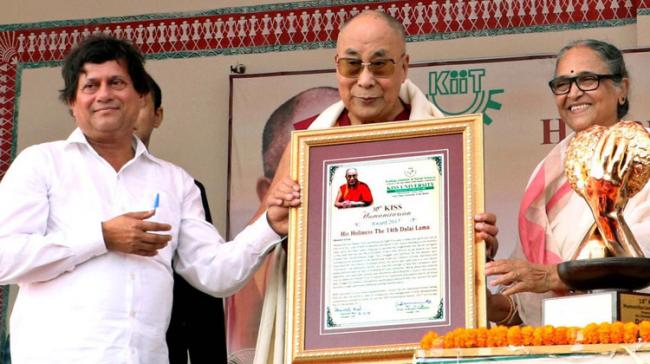 Dalai Lama receiving the 10th KISS Humanitarian Award - 2017 from Founder of KISS University Achyuta Samanta and its president Saswati Bal&amp;amp;nbsp; - Sakshi Post