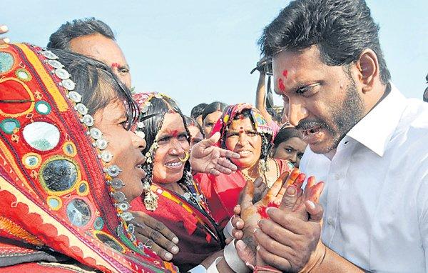 YS Jagan interacting with tribal women at Hussainapuram - Sakshi Post