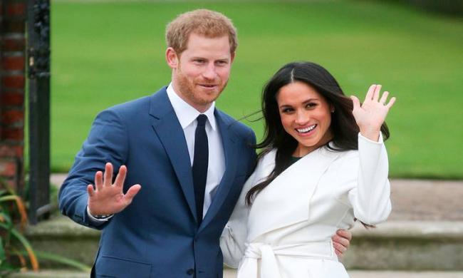 Prince Harry and his American actress fiance Meghan Markle - Sakshi Post