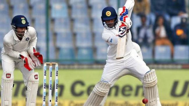 Dhananjaya and Chandimal stitched an unbeaten 84-run partnership for the fifth wicket to keep India waiting when umpires called it an end to the first session, on the final day of the third Test at the Ferozeshah Kotla - Sakshi Post