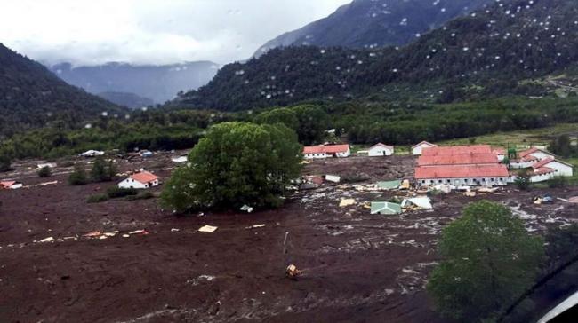 Rains caused a river to overflow and the side of a hill collapsed, burying 20 of the 200 houses in the village located 1,272 kilometers south of the capital - Sakshi Post