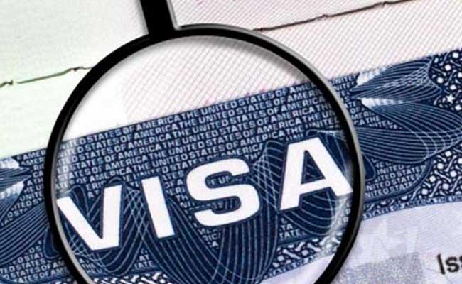 The H-1B is a common visa route for highly skilled foreigners to find work at companies in the US. - Sakshi Post