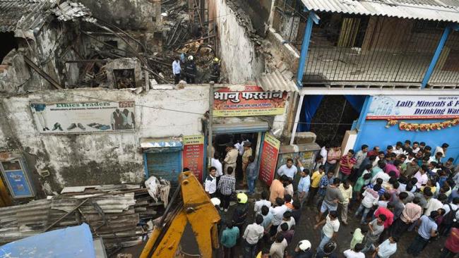 The shop gutted in a fire mishap located at Makaria Compound on the Khairani road, in Mumbai on Monday. - Sakshi Post