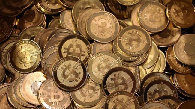 The price of bitcoin rose over 10 per cent to 1.99 million yen ($17,594) this month, coinciding with its futures debut on a major US stock exchange - Sakshi Post