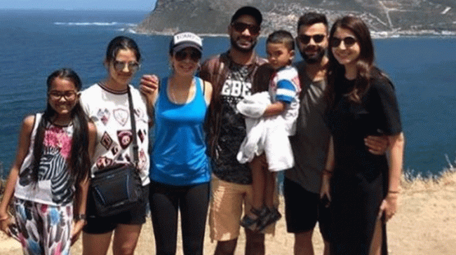 Virushka with shikar Dhawan and family - Sakshi Post