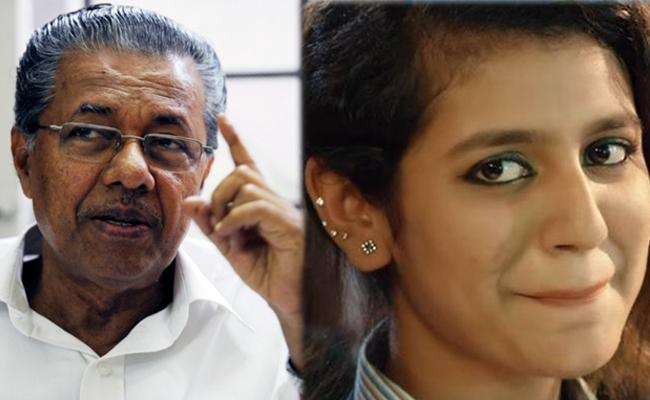 Kerala Chief Minister Pinarayi Vijayan and Priya Prakash Varrier Kerala Chief Minister Pinarayi Vijayan and Priya Prakash Varrier - Sakshi Post
