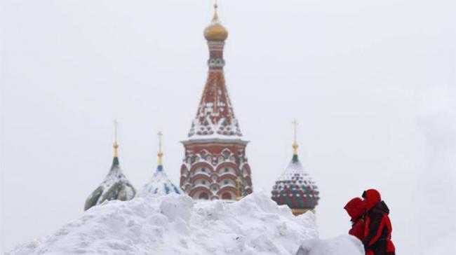 People walk in Red Square near the St Basil’s Cathedral after a heavy snowfall in central Moscow, Russia February 5, 2018.&amp;amp;nbsp; - Sakshi Post