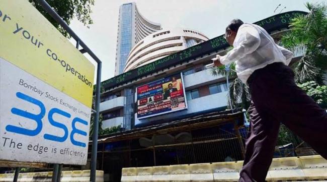 The key Indian equity indices on Tuesday provisionally closed in the green with healthy buying in IT, Teck (technology, media and entertainment) and auto stocks. - Sakshi Post
